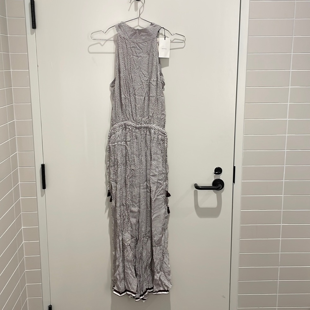 NWT Anthropologie brand “Faithfull” Jumpsuit with open back!